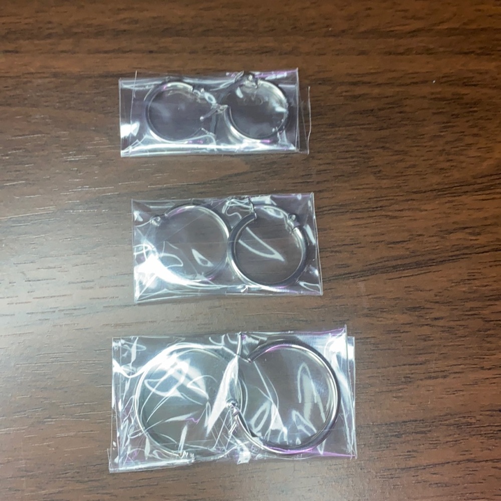 Small medium and large silver hoops